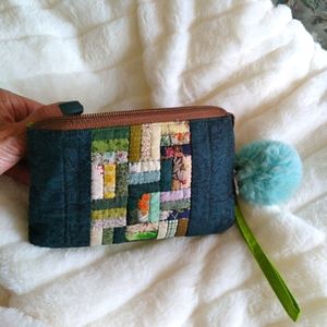 QLC Muti- green quilted wallet.